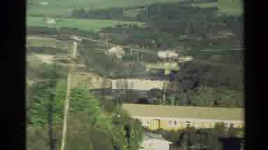 New Zealand (1981): Looking At A River And Then Zooming In On A Waterfall Near A