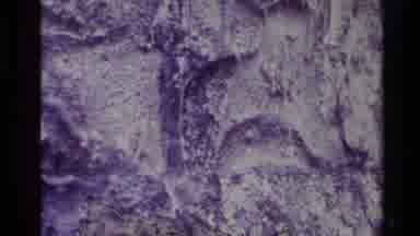 New Zealand (1981): Starts As Blank Wall Then Man View A Town Through Binoculars