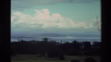 New Zealand (1981): View From The Top Of A Hill With Blue Sky With The Sea And A
