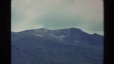 New Zealand (1981): Picture Of A Mountain And Train Station With A Train On