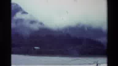 New Zealand (1981): Unstable Aerial Foggy Vegetated And Undeveloped Landscape