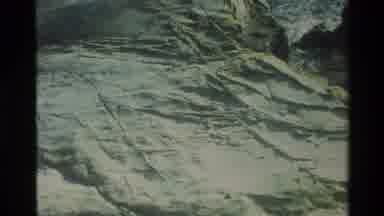 Carmel California USA (1982): A Large Rock On The Shore Of A River With Flowing
