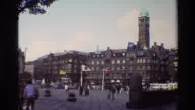 Denmark (1982): A Busy Street With Plenty Of People Near Flags Of Other Countries