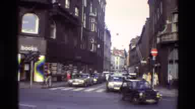 Denmark (1982): Traffic On A City Street Pedestrians Walking On A City Square A