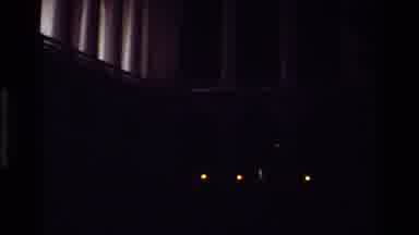 Denmark (1982): Inside A Dark Building With Several Open Windows And Candles