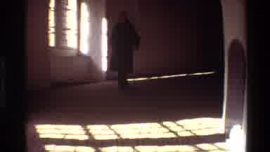 Denmark (1982): Lady In Trench Coat And Jeans Walking With Package In Hall