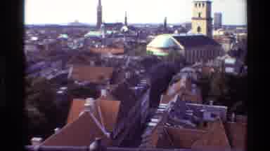 Denmark (1982): Looking Off Of A Ledge At The Roofs Of Buildings And The City