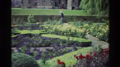 Denmark (1982): Woman In A Maze Of Flowers And Shrubs With Statues