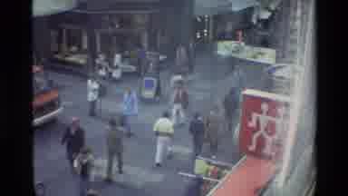 Denmark (1982): People Walking Down A Busy Street Followed By A View Of The City