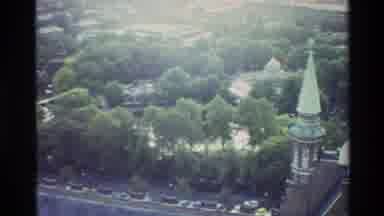 Denmark (1982): View Of White Cathedral Spire And Park Trees On A Sunny Day
