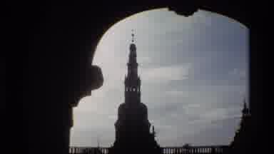 Denmark (1982): View Of Building Spire And Entrances On A Bright Sunny Day