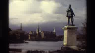 Denmark (1982): A Person Walking Past A Monumental Building