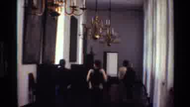 Denmark (1982): Tourist Slowly Walking Through Long Halls Viewing Big Paintings On