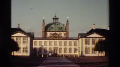 Denmark (1982): Beautiful White Building Facade And A Hill Area With Trees
