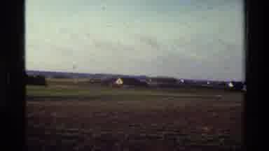 Denmark (1982): A Scene Of Farmyard With A House In The Distance And The Trees And