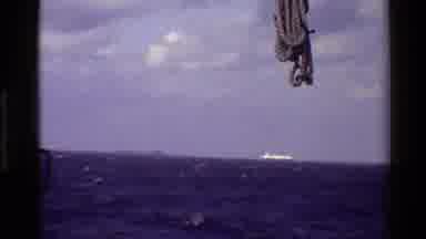 Denmark (1982): Sea Ocean Waves White Boat Island Swinging Rope Sky Clouds