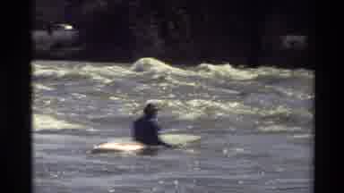 Sacramento California USA (1982): Athlete Goes Down The Kayaking Rapids On A