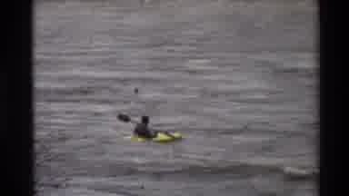 Sacramento California USA (1982): Kayaking On A Large Fast Moving River Which Is
