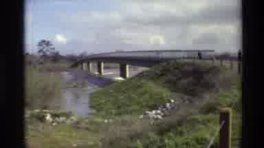 Sacramento California USA (1982): Walking Bridge Over Flowing Creek In Hilly Rural