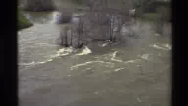 Sacramento California USA (1982): Water Rushing Flooding Trees Men Standing And