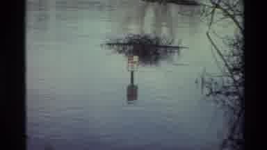 Sacramento California USA (1982): No Parking Sign Sticking Up Out Of A Flood