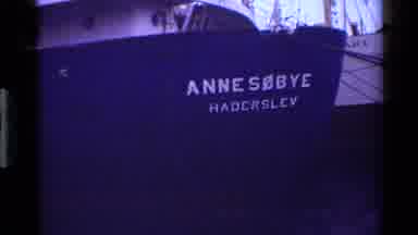Denmark (1983): Zooming Footage Of Foreign Names On Large Ships In Harbor During