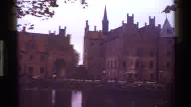 Denmark (1983): A Beautiful Old Building And A Man Drinking Water From A Hand Pump
