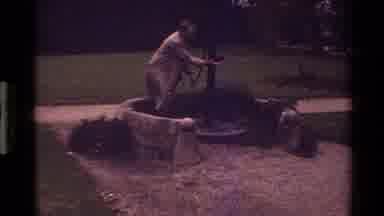 Denmark (1983): Church Building And A Man Pumping Water From A Well