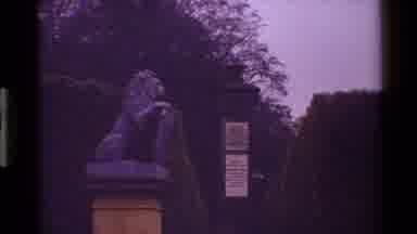 Denmark (1983): Two Lion Statues Placed Next To A Locked Fence With Emblems On It