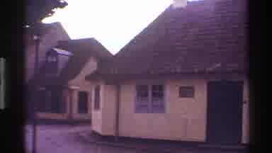 Denmark (1983): Grainy House Footage Shown In Small Neighborhood Zooms In On A