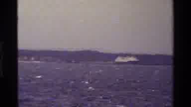 Denmark (1983): Tug Boat And Ships Out In Choppy Water With Coastline Behind