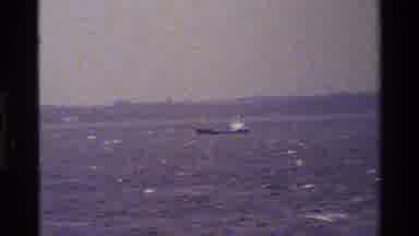 Denmark (1983): Camera Shows Zoom Feature To Capture Smaller Boat In The Distance