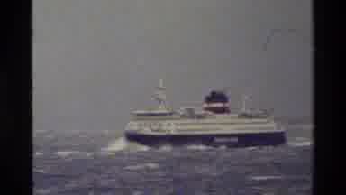 Denmark (1983): A Cruise Ship Floats In Choppy Seas From Right To Left
