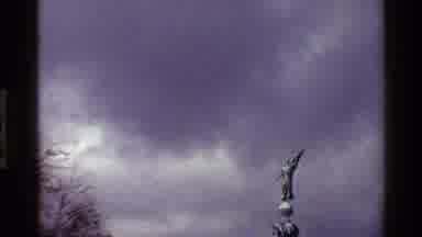 Denmark (1983): View Of Sculpture Standing In Garden Of Yellow Flowers On A Cloudy