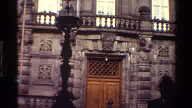Denmark (1983): A Stone Building With A Wooden Door And A Statue Of A Man Riding A