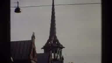 Denmark (1983): Older Video Of Architecture Highlighting A Spire On A Building