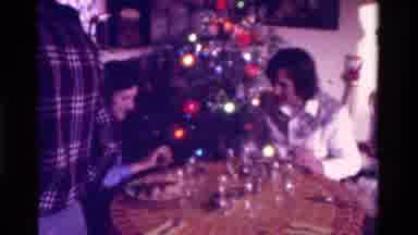 California USA (1975): Men Women And Children Gathered For Dinner During The