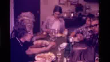 California USA (1975): A Family Having Dinner Together Interacting In Conversation