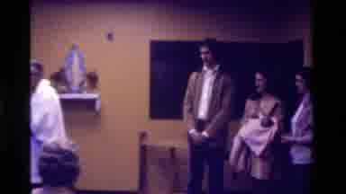 California USA (1975): Couple And Family At Church Watching Communion Given To