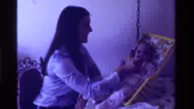 California USA (1975): Feeding Baby With A Spoon