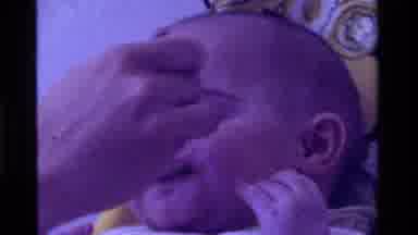 California USA (1975): Baby Gives Bemused Reaction After Being Spoon Feed Soft