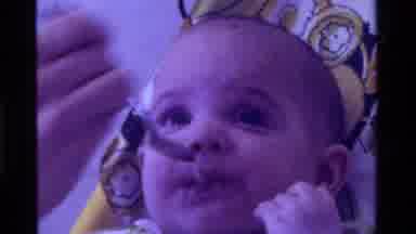 California USA (1975): Baby Being Spoon-Fed Food