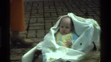 California USA (1975): Babies Washing The Baby Baby Outdoors Playing With Dog