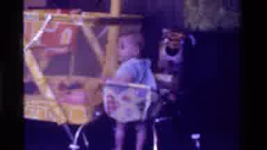 California USA (1975): Happy Baby Watching Program On Television And Totally