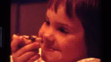 California USA (1977): The Child Was Eating The Pizza And She Likes To Ate The