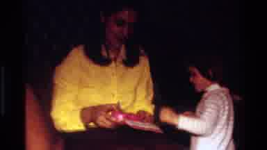 California USA (1977): Child Opening Gifts For Xmas
