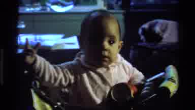 California USA (1977): The Baby Was Sitting In The Wheelchair And Watching