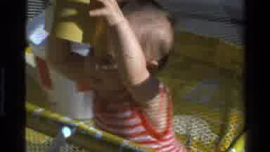 California USA (1977): The Little Child Playing There He Is Very Happy To Play