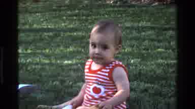 California USA (1977): Small Baby Sitting And Crawling And Playing With Various