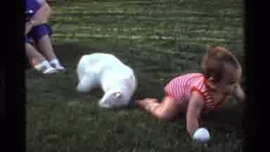 California USA (1977): A Place Like A Square A Mother And Her Baby With A White